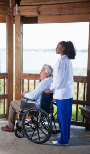 female caregiver with male senior client